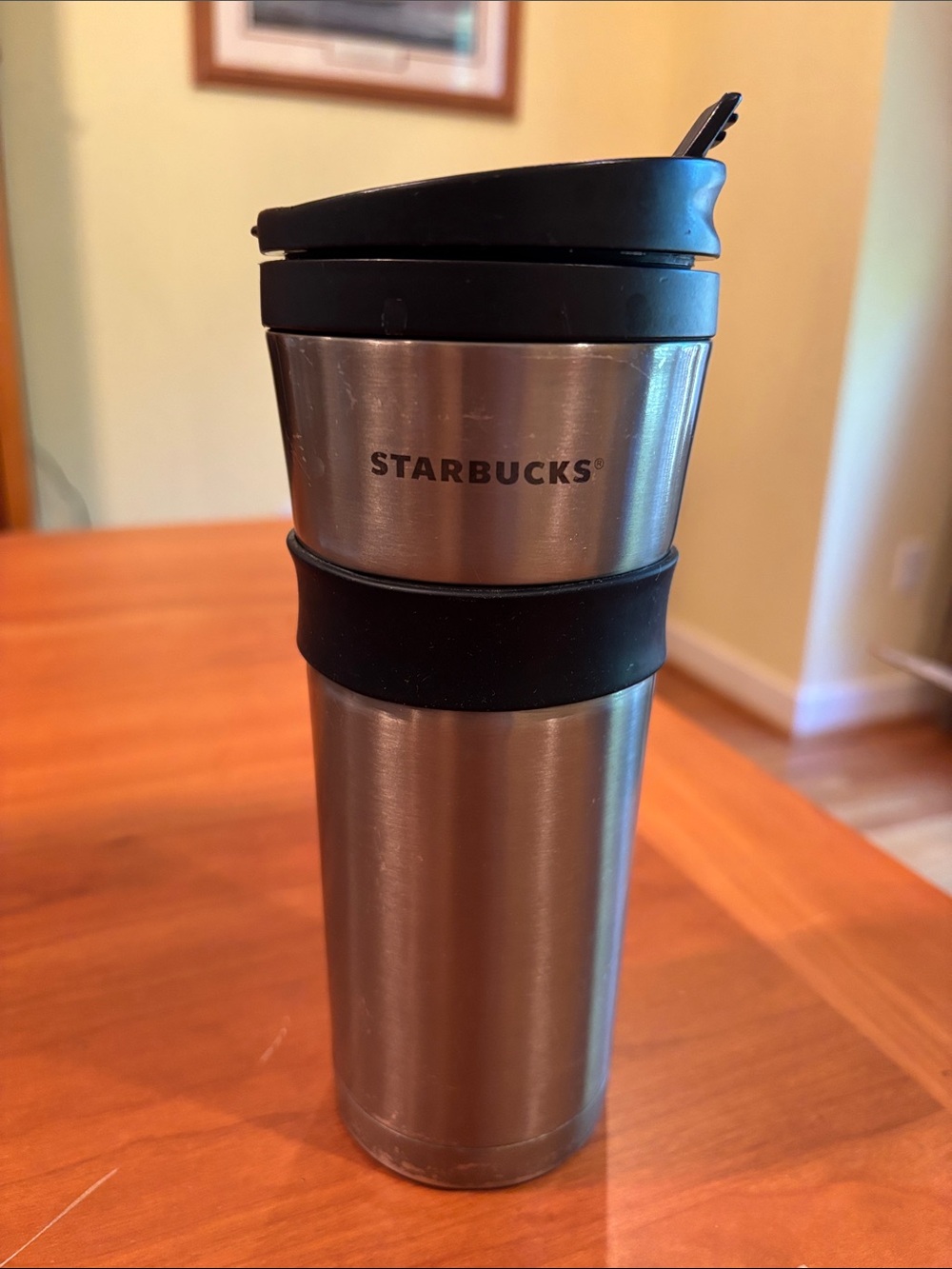 Starbucks 2011 Silver Travel Mug with Black Lid and Grip 16oz